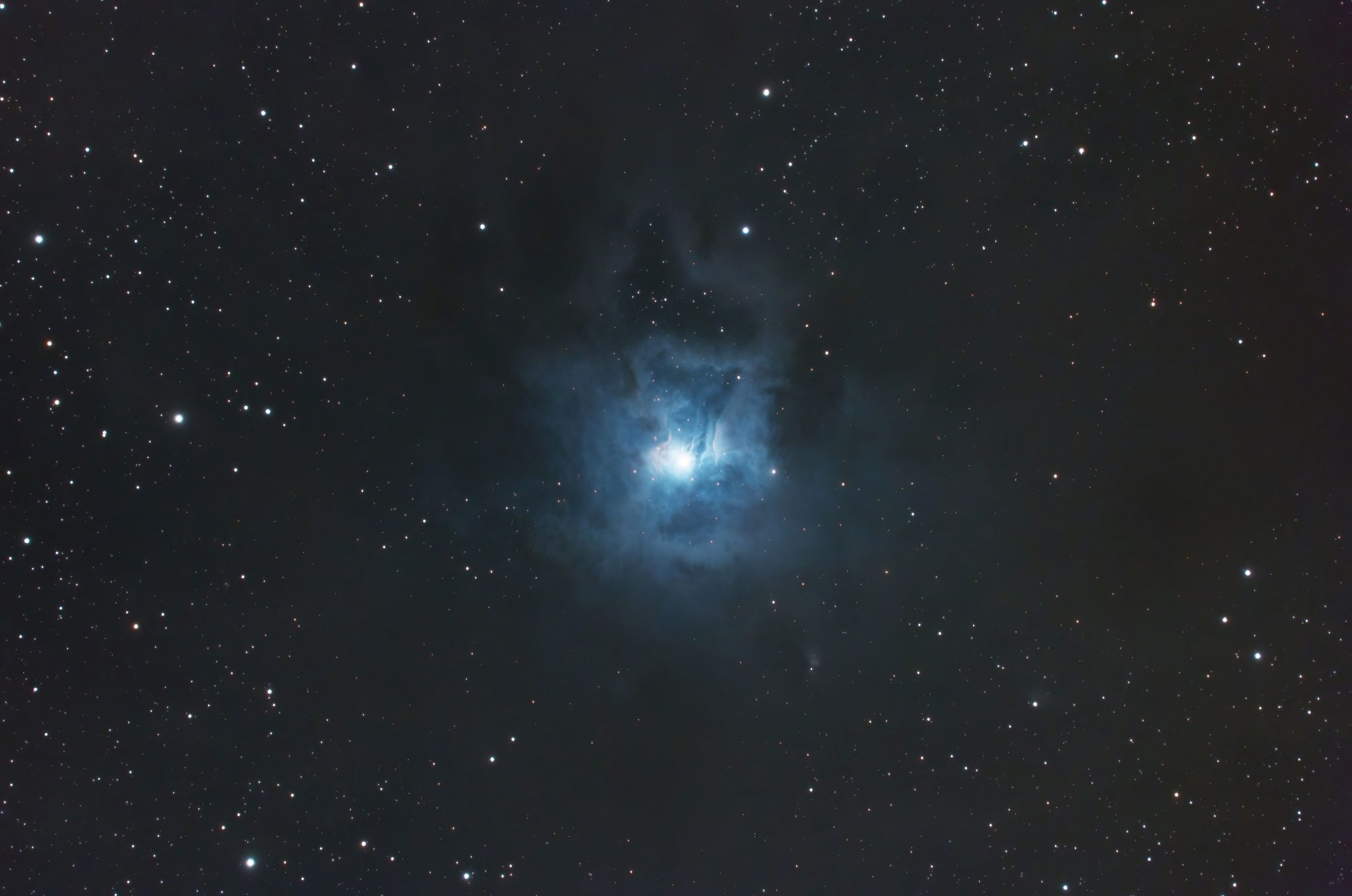 deep space photograph of the iris nebula amateur astrophotography